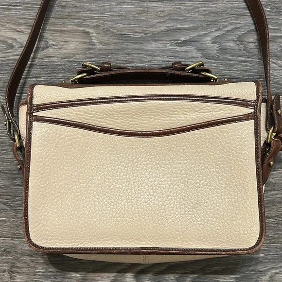 Vintage Dooney & Bourke All Weather Raw Leather
Carrier Shoulder Bag Crossbody - Picture 4 of 17